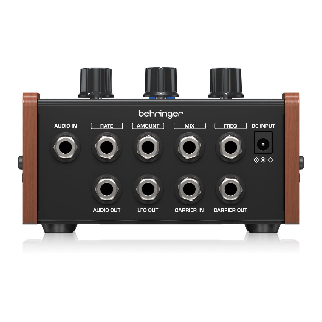 Behringer BM-12 with various ins and outs on a white background