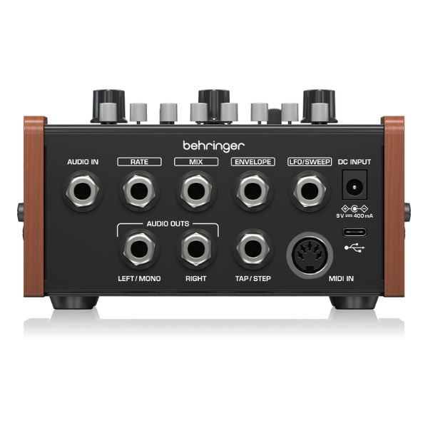 Behringer audio interface with various connectors on a white background