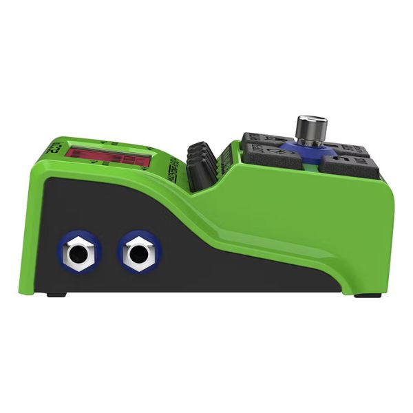 Green and black electronic device with blue eyes on a white background